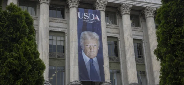 A banner with President Trump's face reading USDA: Growing America since 1852