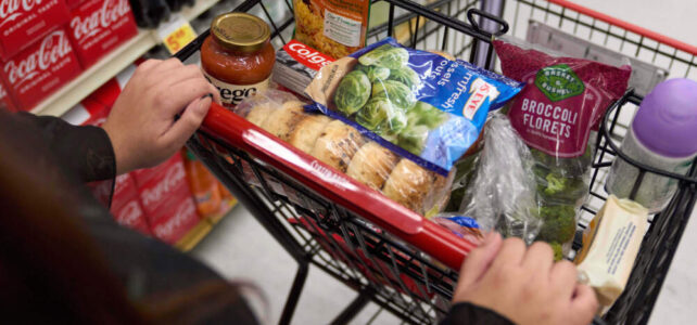A California's SNAP benefits shopper pushes a cart through a supermarket in Bellflower, Calif., Feb. 13, 2023. (Allison Dinner/AP)