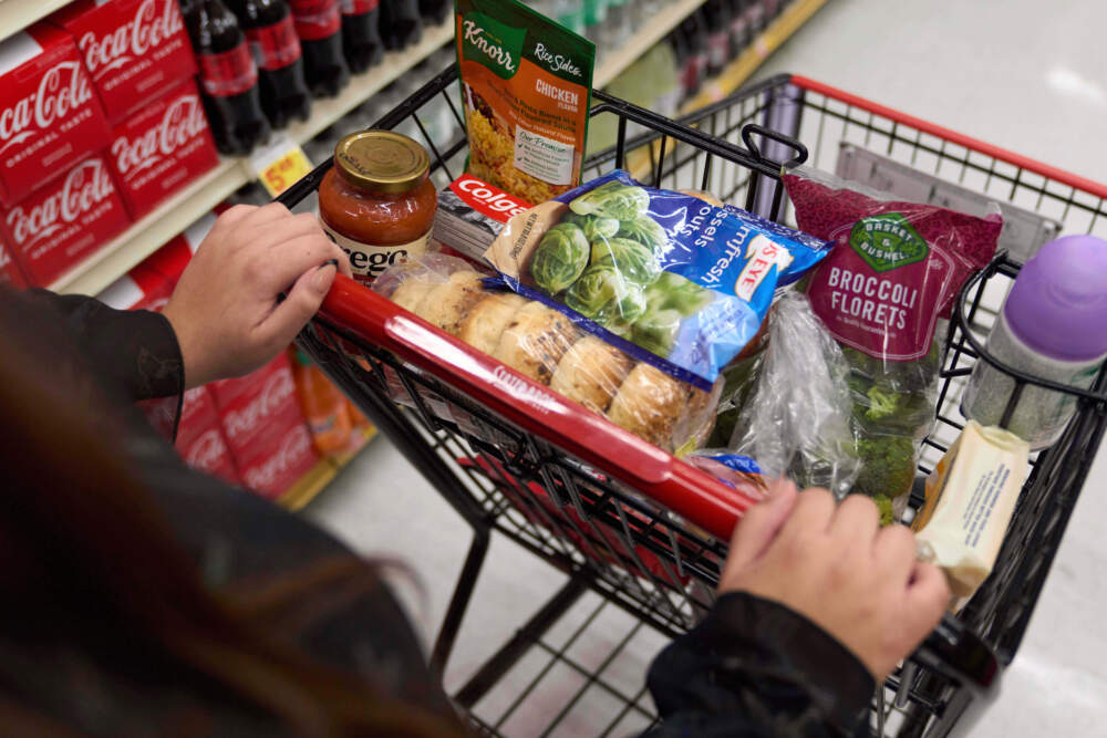 A California's SNAP benefits shopper pushes a cart through a supermarket in Bellflower, Calif., Feb. 13, 2023. (Allison Dinner/AP)