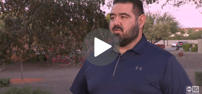 Steve Gomez is interviewed in a parking lot