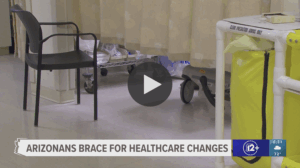 An image from inside a hospital with a banner at the bottom reading "Arizonans brace for healthcare changes"