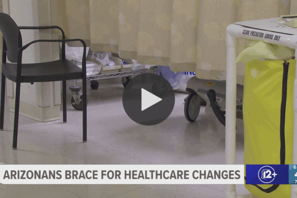 An image from inside a hospital with a banner at the bottom reading "Arizonans brace for healthcare changes"