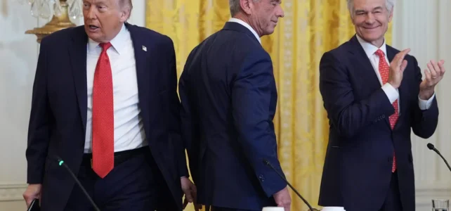 President Donald Trump arrives to an event to promote investment in rural health care in the East Room of the White House, Friday, Jan. 16, 2026, in Washington. Standing with the President are Secretary of Health and Human Services, Robert F. Kennedy, Jr., and Mehmet Oz, Administrator for the Centers for Medicare & Medicaid Services. (AP Photo/Evan Vucci)